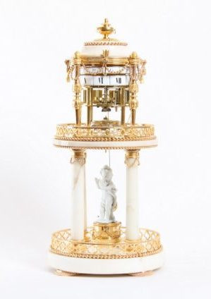 A French Louis XVI ormolu and marble cercles tournants mantel clock, Gille A Paris, circa 1775 by Gille A Paris