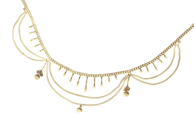 Antique gold bow necklace with natural seed pearls by Artista Desconocido