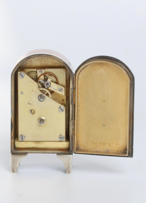 A miniature Swiss silver guilloche  enamel timepiece, circa 1900 by Artista Desconocido