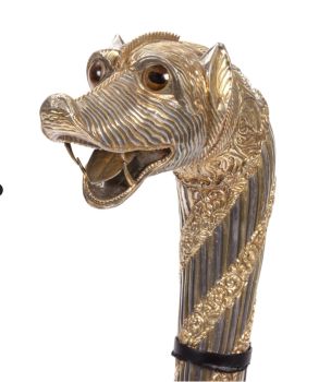 An Indian part-gilt silver-clad ceremonial sceptre or mace with a tiger’s head by Artista Desconhecido