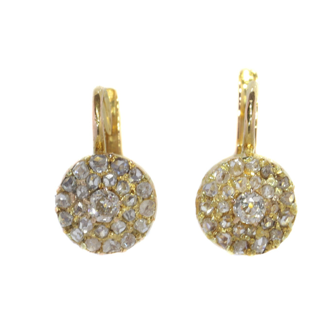 Victorian old mine cut diamond earrings with double row rose cut diamonds by Artista Desconhecido