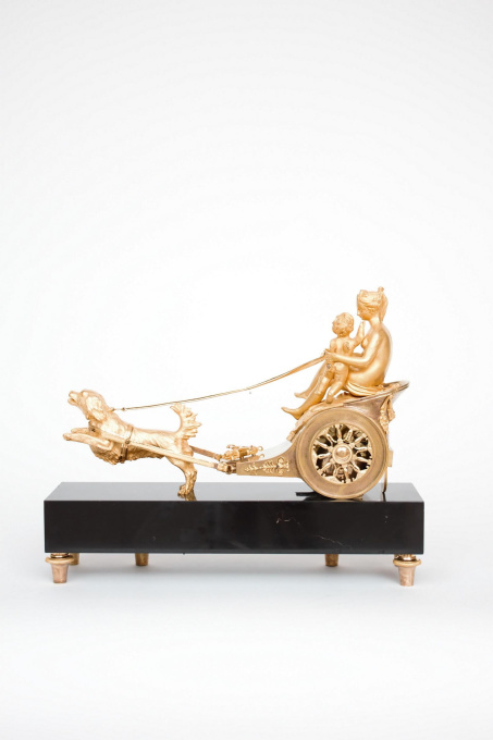 A French empire ormolu and marble chariot mantel clock, circa 1800 by Artista Desconocido