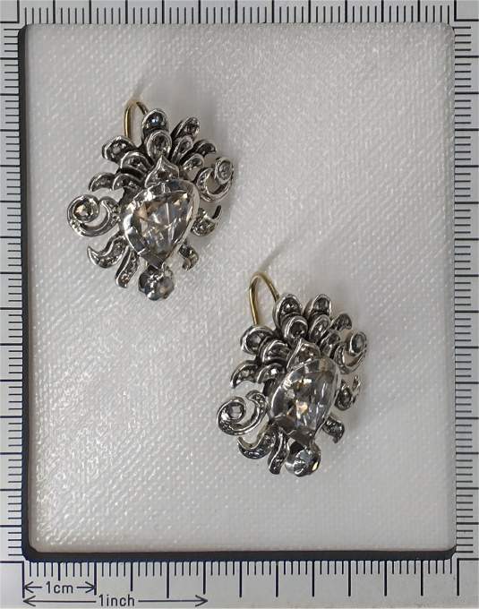 Victorian earrings with large pear shaped rose cut diamonds by Onbekende Kunstenaar